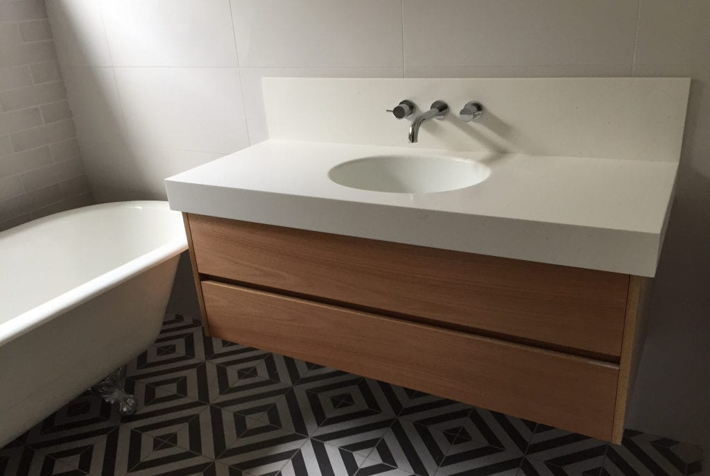 Vanity with integrated basin